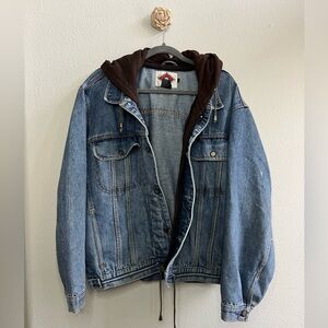 Oversized denim jacket, size Large. Layered look with brown hoodie.
